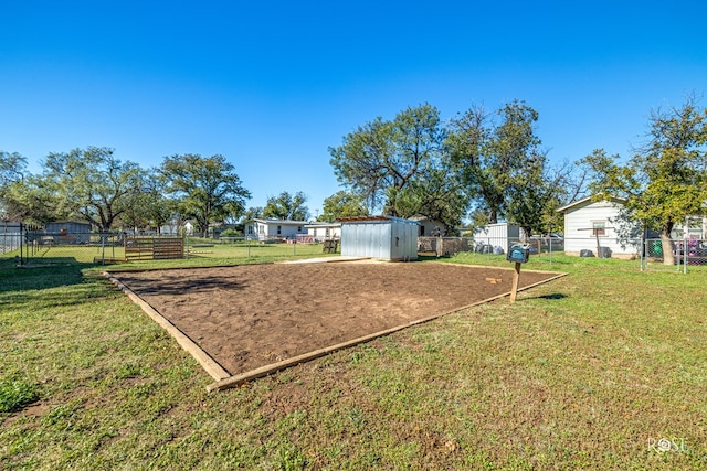 view of home's community featuring a lawn