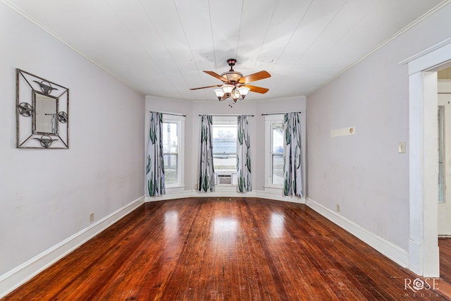 unfurnished room featuring ornamental molding, dark hardwood / wood-style floors, and ceiling fan