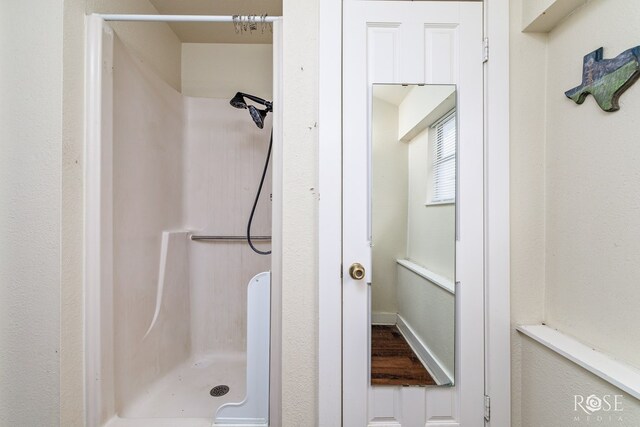 bathroom with a shower