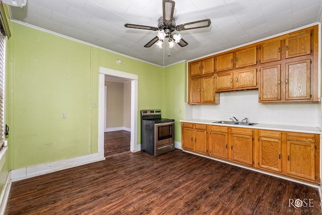 kitchen featuring dark hardwood / wood-style floors, sink, stainless steel range with electric cooktop, ceiling fan, and crown molding