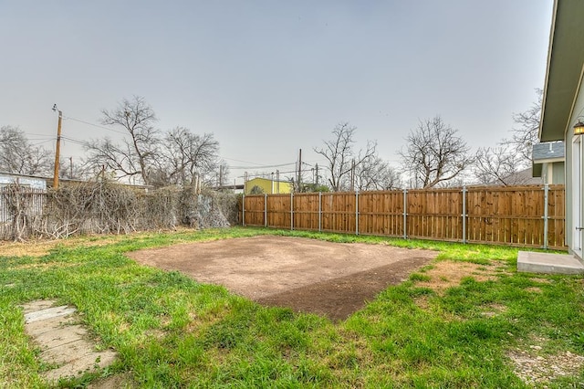 view of yard with a fenced backyard and a patio