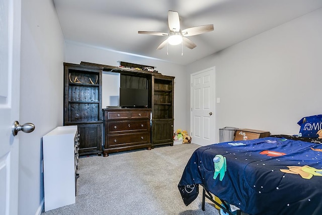 bedroom featuring ceiling fan and carpet flooring