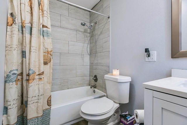 bathroom featuring vanity, toilet, and shower / bathtub combination with curtain