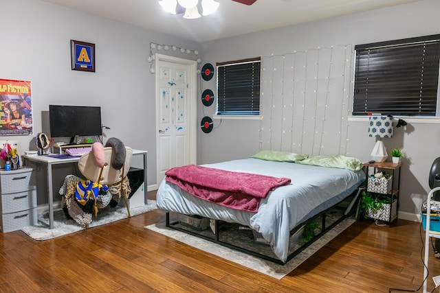 bedroom with wood finished floors