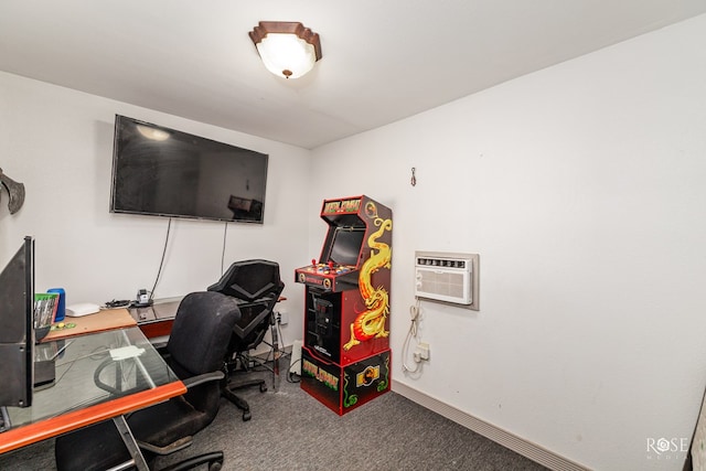 carpeted office space featuring a wall mounted AC and baseboards