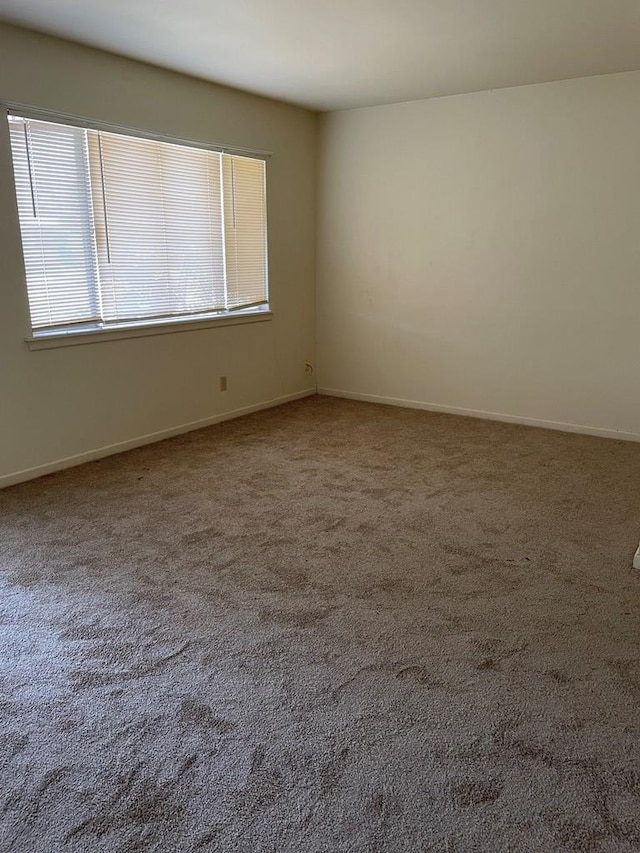 131 Oakwood St, San Angelo, TX 76903 - spare room with carpet and baseboards