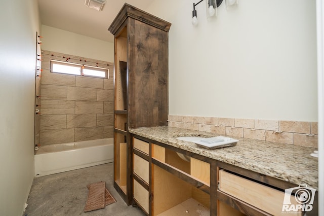 bathroom featuring visible vents, unfinished concrete flooring, shower / bathing tub combination, and vanity