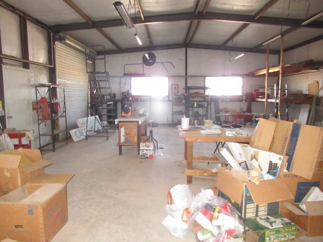 garage with a workshop area