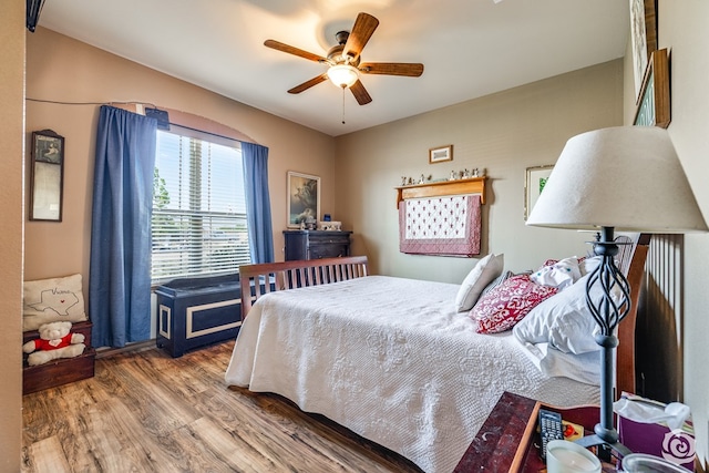 3537 Buck Run, San Angelo, TX 76901 - bedroom with wood finished floors and ceiling fan