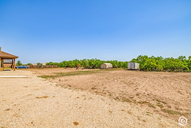 3537 Buck Run, San Angelo, TX 76901 - view of yard featuring a storage unit and an outbuilding
