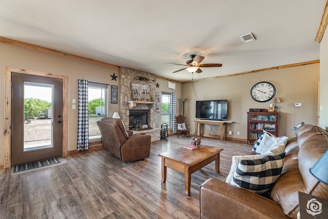 3537 Buck Run, San Angelo, TX 76901 - living room featuring ceiling fan, baseboards, visible vents, and wood finished floors