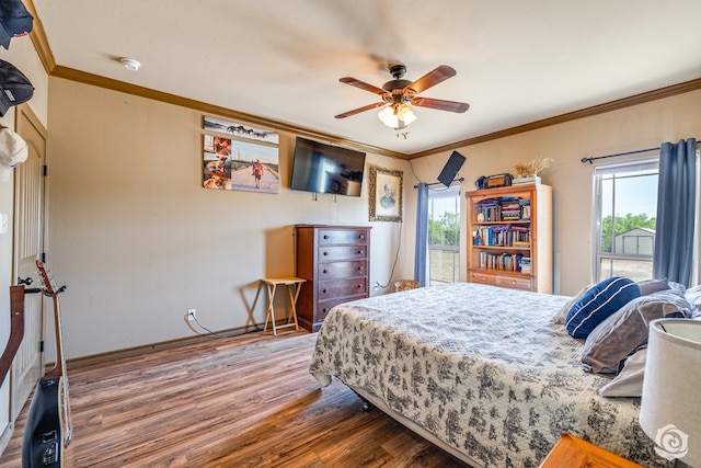 3537 Buck Run, San Angelo, TX 76901 - bedroom featuring baseboards, ceiling fan, crown molding, and wood finished floors