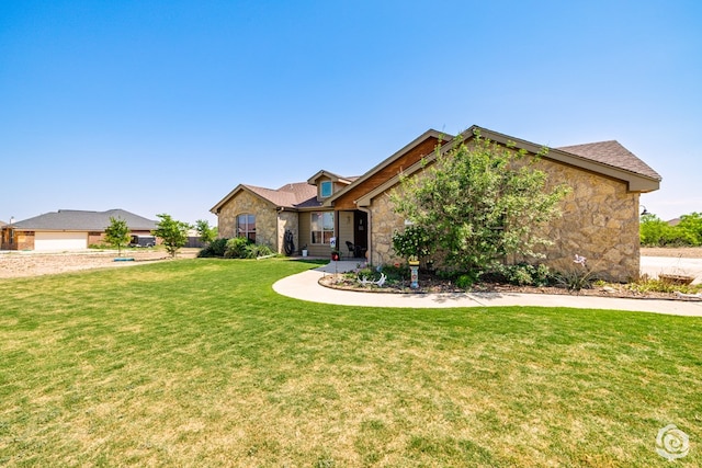 3537 Buck Run, San Angelo, TX 76901 - ranch-style home featuring stone siding and a front yard