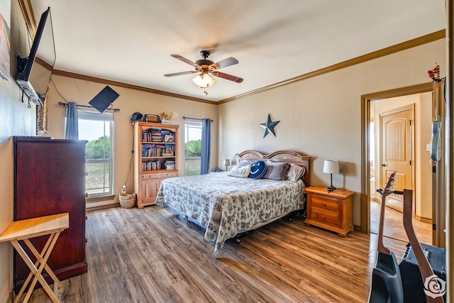 3537 Buck Run, San Angelo, TX 76901 - bedroom featuring ceiling fan, ornamental molding, and wood finished floors