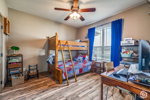 3537 Buck Run, San Angelo, TX 76901 - bedroom featuring wood finished floors and a ceiling fan