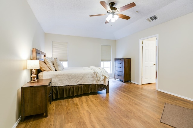 4413 Pinon Ridge Dr, San Angelo, TX 76904 - bedroom featuring light wood-style floors, baseboards, and a ceiling fan