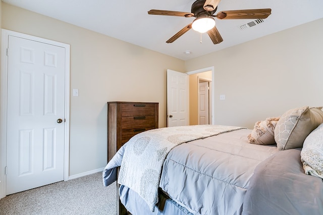 4413 Pinon Ridge Dr, San Angelo, TX 76904 - bedroom featuring light carpet, baseboards, and a ceiling fan