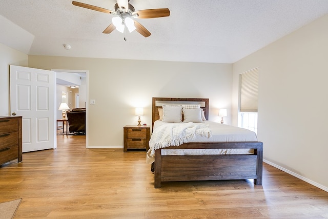 4413 Pinon Ridge Dr, San Angelo, TX 76904 - bedroom with light wood-style flooring, baseboards, and ceiling fan