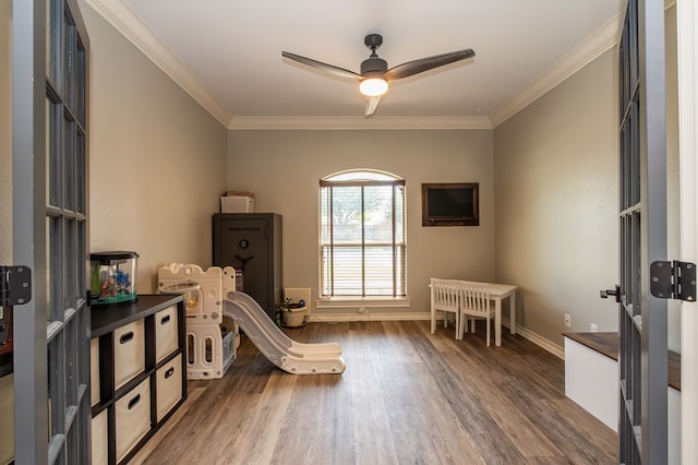 3918 Caroline Ln, San Angelo, TX 76904 - living area with wood finished floors, ceiling fan, ornamental molding, and baseboards