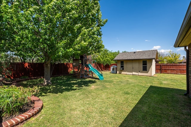 3918 Caroline Ln, San Angelo, TX 76904 - view of yard featuring a playground and an outdoor structure