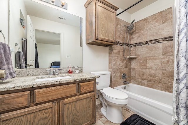 full bathroom featuring shower / tub combo with curtain, vanity, and toilet