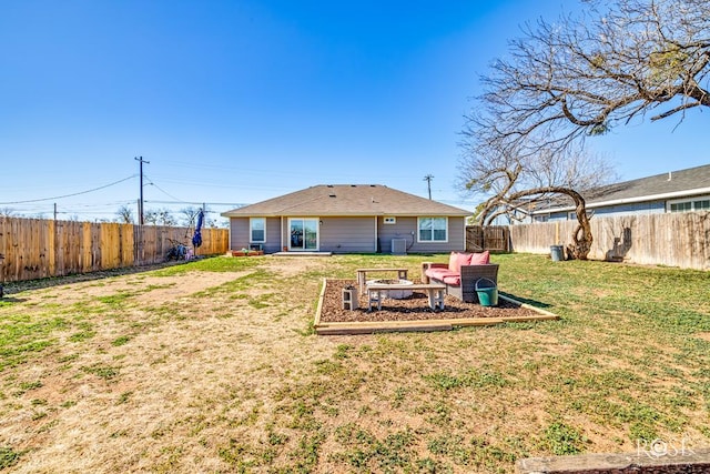 back of house featuring an outdoor living space, a yard, and central AC unit