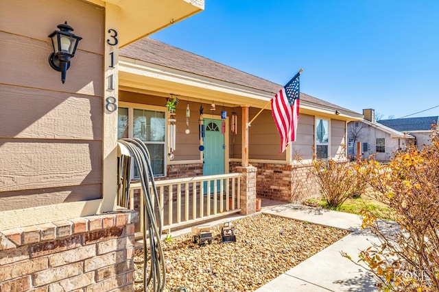 property entrance with a porch