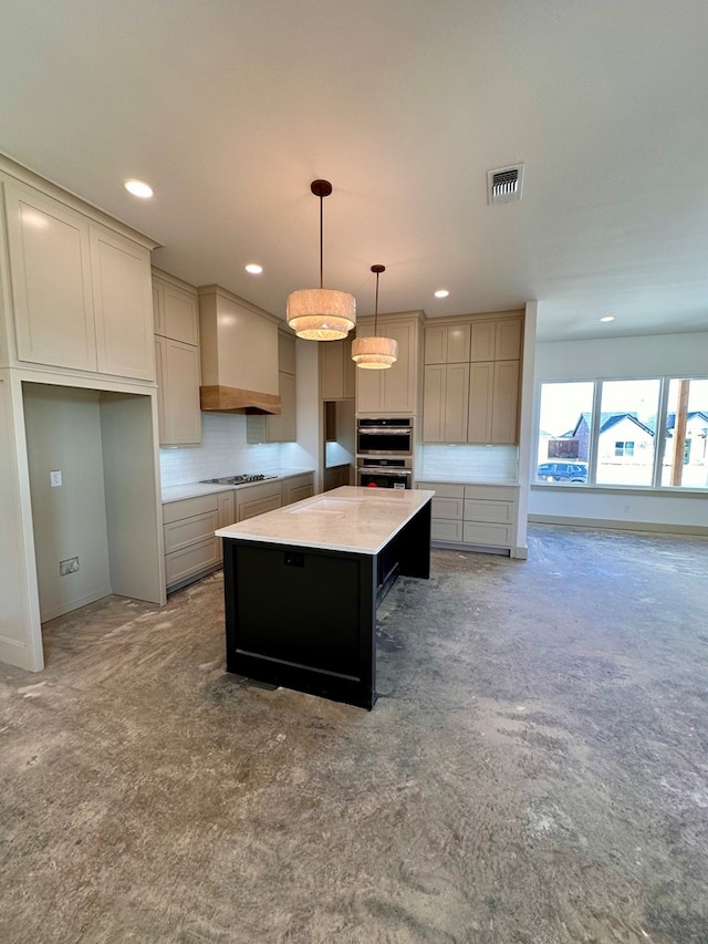 kitchen with carpet flooring, custom range hood, tasteful backsplash, and visible vents