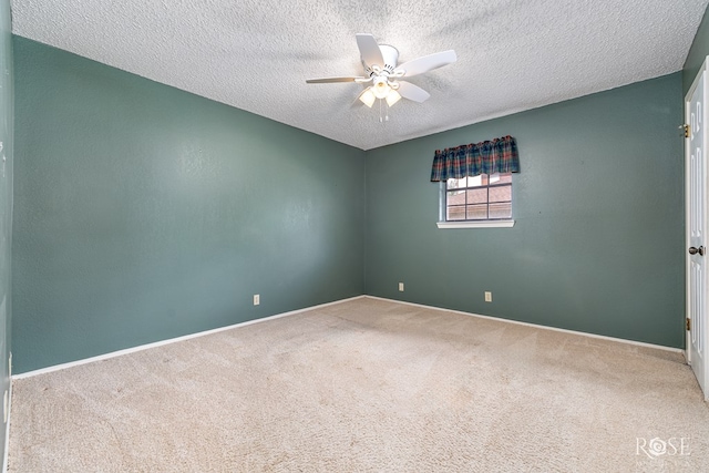 3222 Oak Mountain Trl, San Angelo, TX 76904 - carpeted spare room with a ceiling fan and a textured ceiling