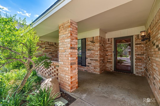 3222 Oak Mountain Trl, San Angelo, TX 76904 - view of exterior entry with brick siding and covered porch