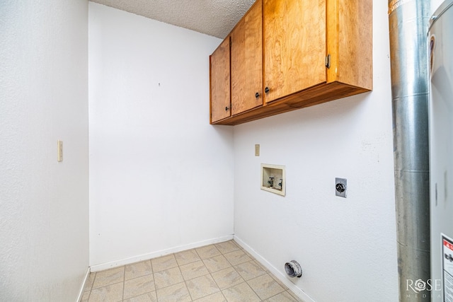 3222 Oak Mountain Trl, San Angelo, TX 76904 - washroom featuring cabinet space, washer hookup, a textured ceiling, and hookup for an electric dryer