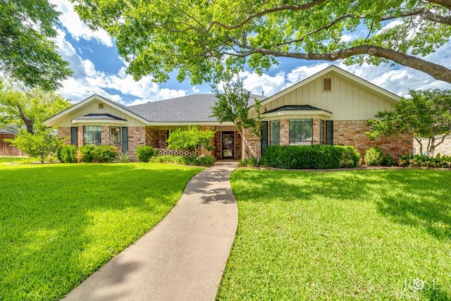 3222 Oak Mountain Trl, San Angelo, TX 76904 - ranch-style house featuring brick siding and a front yard