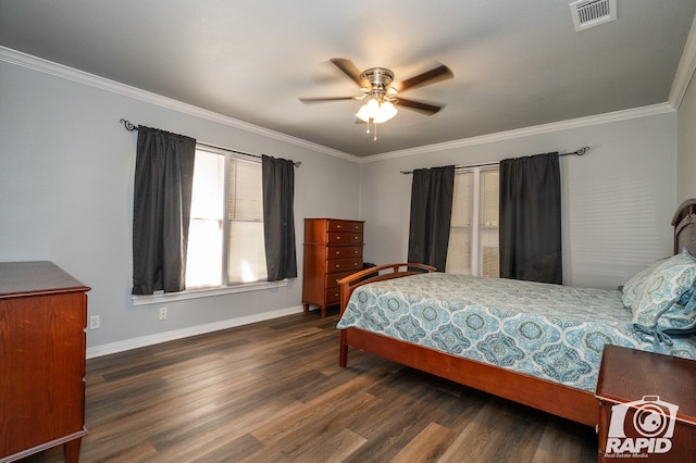 bedroom with dark wood-type flooring, ornamental molding, and ceiling fan