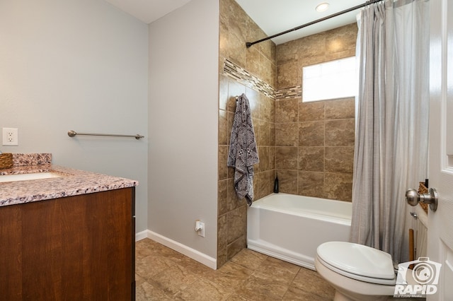 full bathroom featuring shower / bathtub combination with curtain, vanity, and toilet