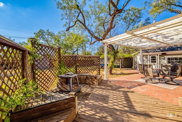 wooden deck with a pergola