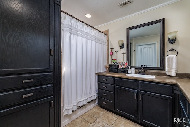 bathroom featuring crown molding, tile patterned floors, shower / bathtub combination with curtain, and vanity