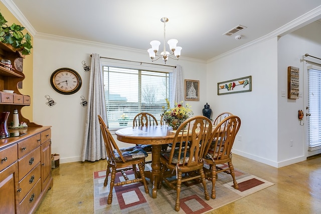 dining room with ornamental molding, visible vents, a notable chandelier, and baseboards