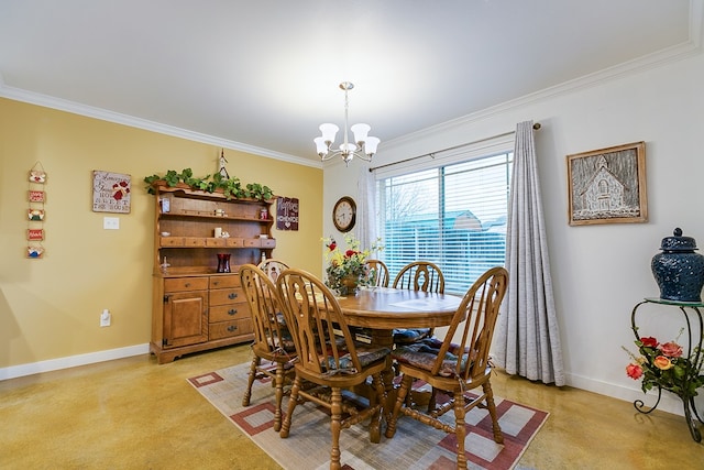 dining area with a chandelier, ornamental molding, and baseboards