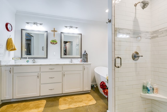 bathroom featuring a freestanding tub, a stall shower, a sink, and crown molding