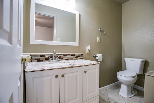 220 Mcdowell St, Bronte, TX 76933 - half bathroom featuring vanity, tile patterned floors, and backsplash