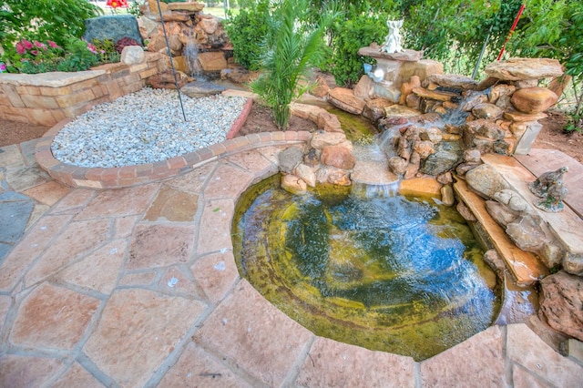 220 Mcdowell St, Bronte, TX 76933 - exterior view of a small pond