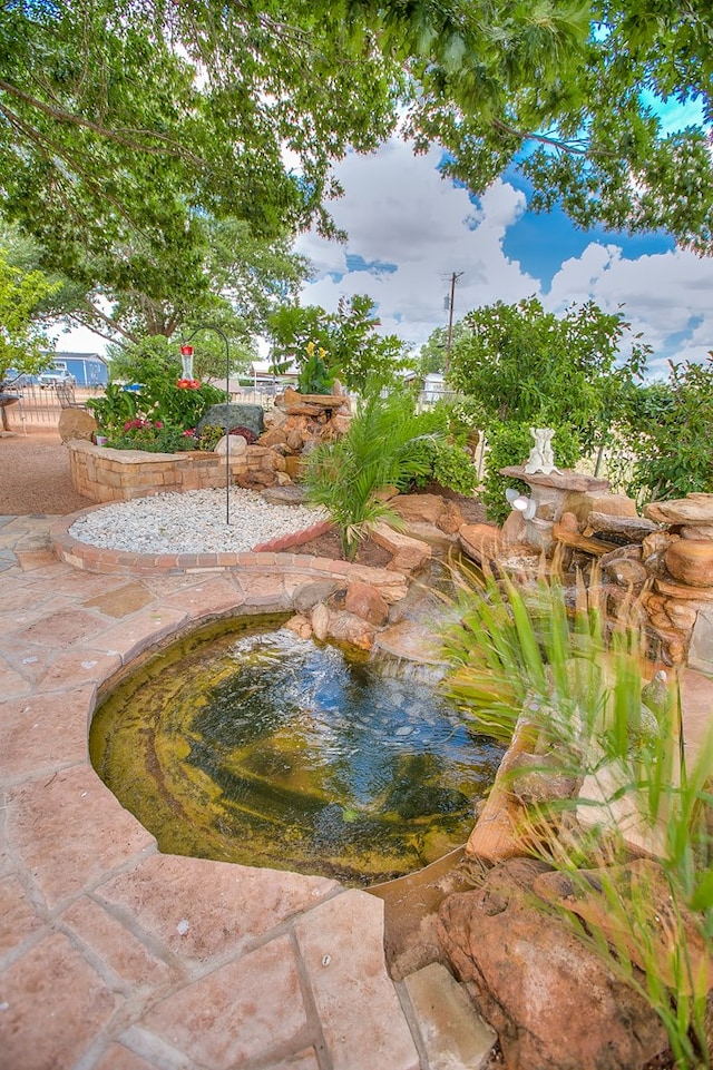 220 Mcdowell St, Bronte, TX 76933 - view of pool featuring a garden pond