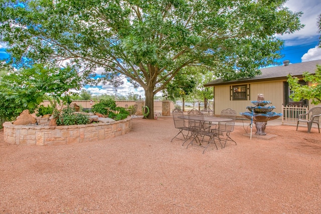 220 Mcdowell St, Bronte, TX 76933 - view of patio featuring outdoor dining area