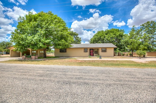 220 Mcdowell St, Bronte, TX 76933 - ranch-style home with driveway and an attached carport