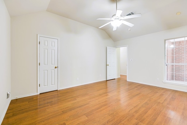 55 Southridge Dr, San Angelo, TX 76904 - spare room with vaulted ceiling, light wood-type flooring, a ceiling fan, and baseboards
