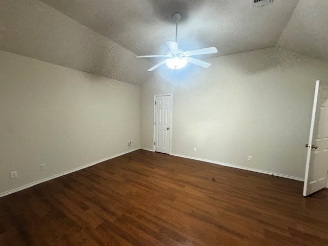 55 Southridge Dr, San Angelo, TX 76904 - additional living space with lofted ceiling, ceiling fan, wood finished floors, baseboards, and a textured ceiling