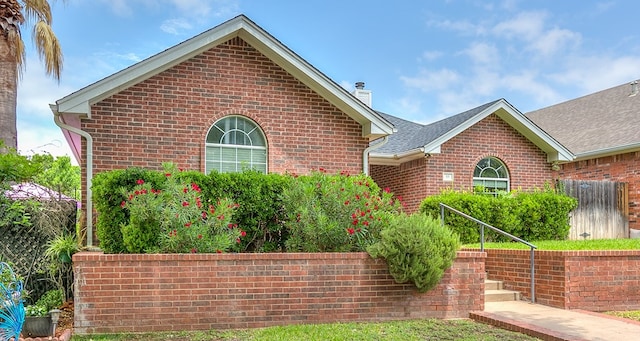 55 Southridge Dr, San Angelo, TX 76904 - ranch-style house with brick siding and a chimney