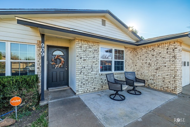 property entrance featuring a garage