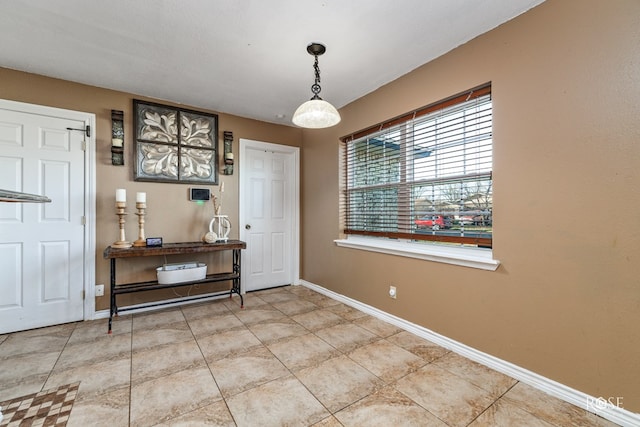 entryway featuring tile patterned flooring