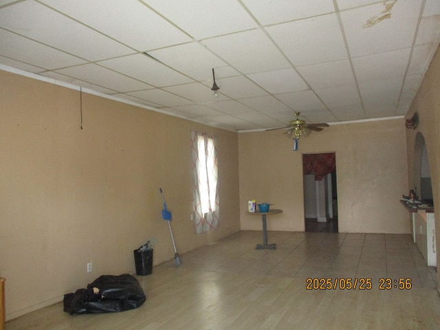 621 E Harris Ave, San Angelo, TX 76903 - spare room featuring ceiling fan, wood finished floors, and a paneled ceiling